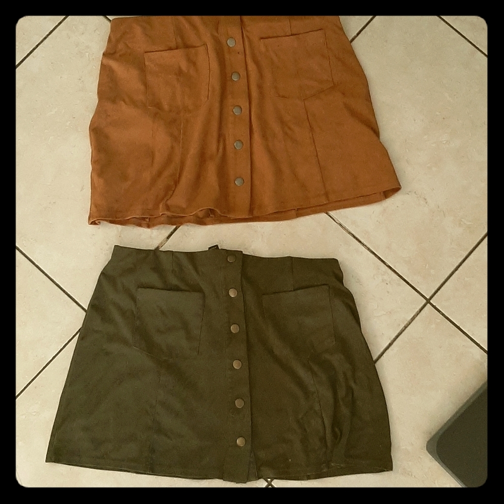 2  mini brown and green skirts